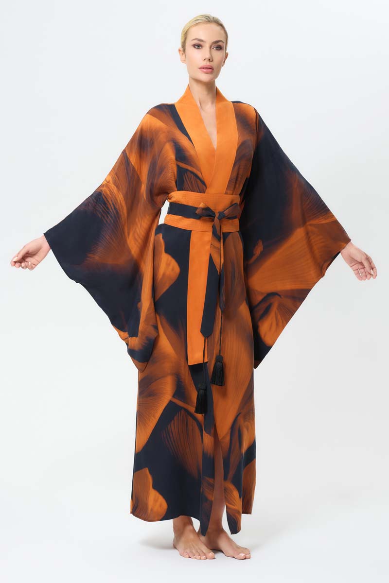 NiLuu Loren Anya oriental kimono robe with intricate pattern and flowing fabric, displayed on a mannequin.