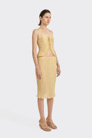 Yellow mustard Lotus Leaf Mini Top by Stolen Stores, featuring ruffled lotus leaf design and sleeveless style.