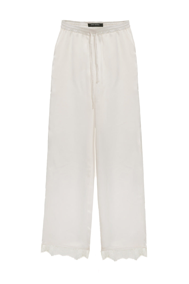 Ivory Kris Marán lounge pants with lace detail, featuring a relaxed fit and comfortable fabric for casual wear.