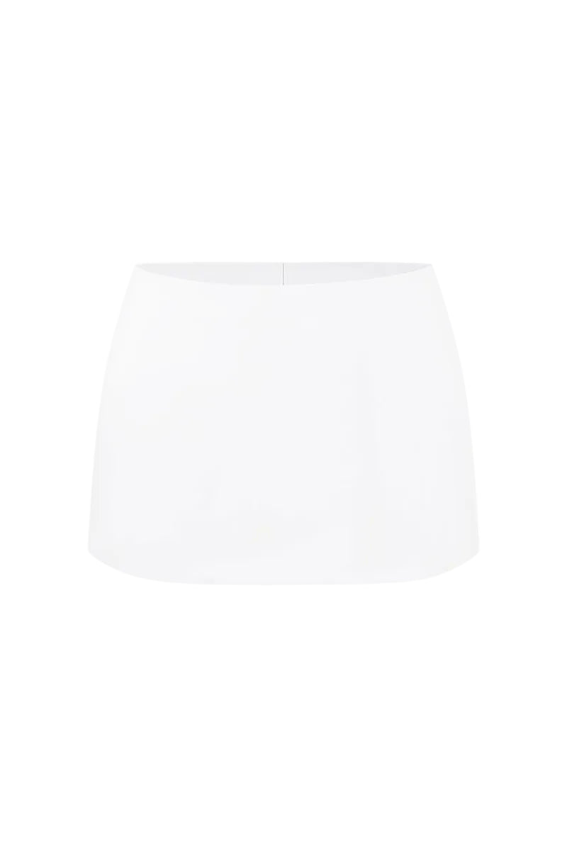 Off-white low waist mini skirt by Stolen Stores featuring a fitted design and short length, perfect for casual or stylish outfits.