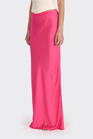 Hot pink low-waist maxi skirt by Stolen Stores, flowing fabric with a relaxed fit and stylish design.