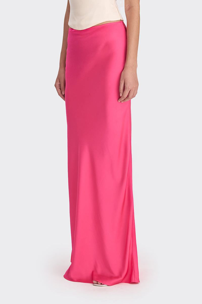 Hot pink low-waist maxi skirt by Stolen Stores, flowing fabric with a relaxed fit and stylish design.
