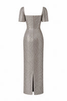 Silver Lujain sequin gown by Nihan Peker, featuring a flowing design with shimmering sequins and elegant fabric.