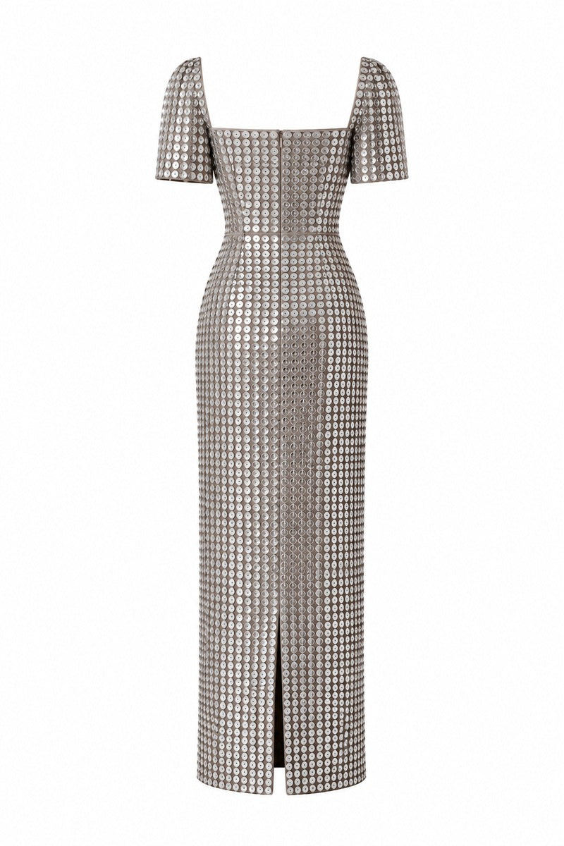 Silver Lujain sequin gown by Nihan Peker, featuring a flowing design with shimmering sequins and elegant fabric.