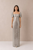 Silver Lujain sequin gown by Nihan Peker with intricate sequin details and elegant fit, perfect for formal occasions.