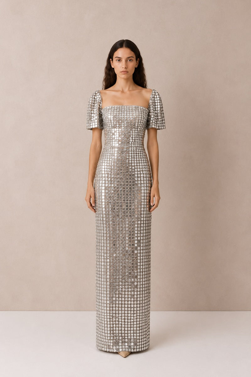 Silver Lujain sequin gown by Nihan Peker with intricate sequin details and elegant fit, perfect for formal occasions.