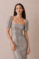 Silver Lujain sequin gown by Nihan Peker, featuring shimmering sequins and elegant design, perfect for formal occasions.