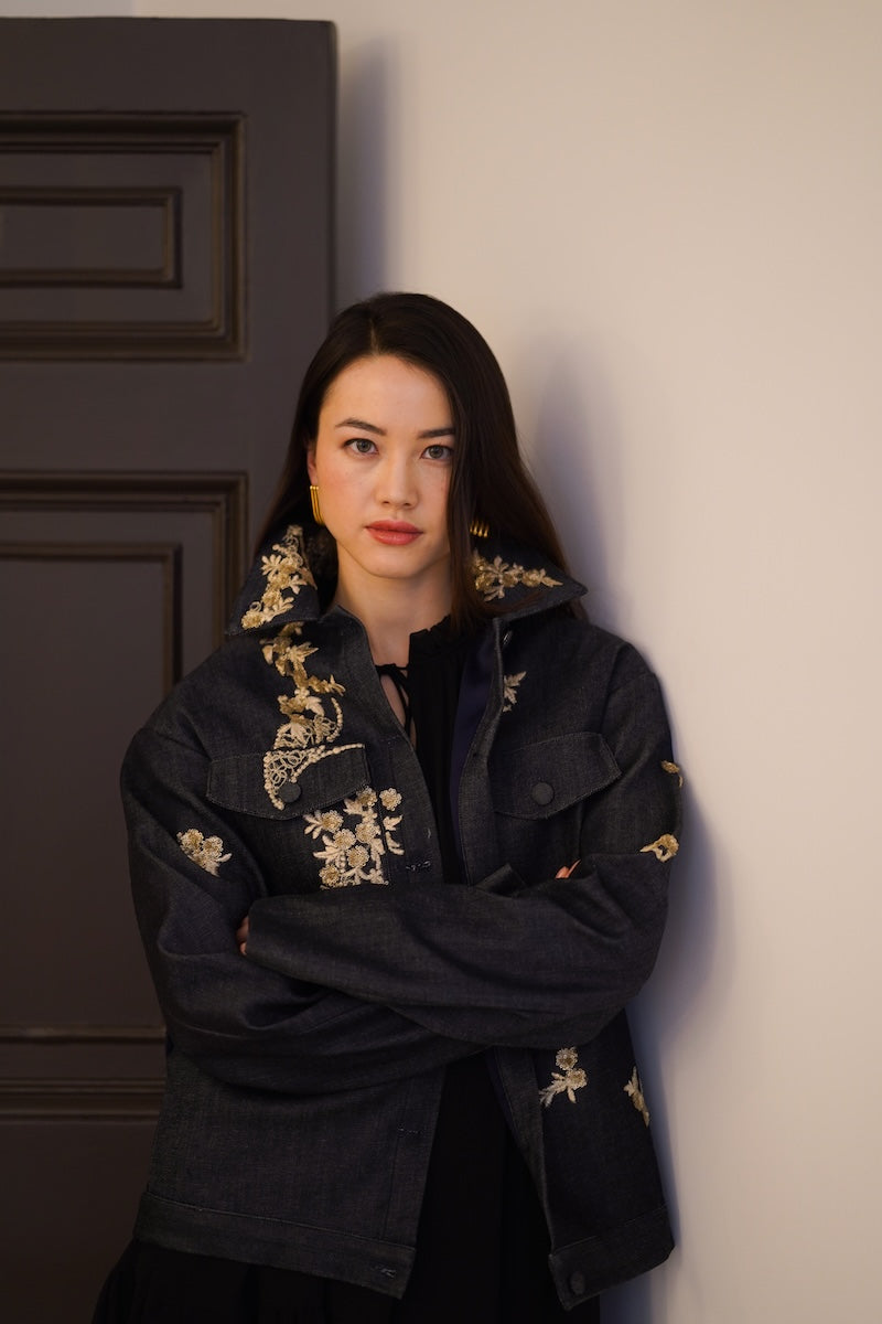 Nadya Shah LUMIN dark denim jacket displaying front view with classic collar, button closure, and stylish fit.