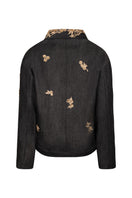 Nadya Shah LUMIN dark denim jacket on a mannequin, showcasing the back view of the stylish casual jackets.