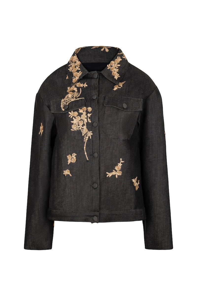 Nadya Shah LUMIN dark denim jacket on a mannequin, front view showing classic fit and stitching details.