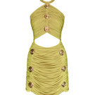 Gigii's Lumina mini dress displayed on a hanger, showcasing its stylish design and vibrant color perfect for casual or evening wear.