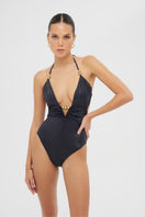 Shiny black Luna one-piece swimsuit by Maliluha, featuring a sleek design and smooth fabric perfect for swimming and beachwear.