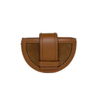 ISIDORA MALVA Luna clutch in toffee, stylish shoulder bag with sleek design and smooth leather finish.