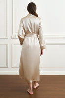 Elegant Luna women's silk robe by MANITO, shown in soft fabric with delicate drape and luxurious design.