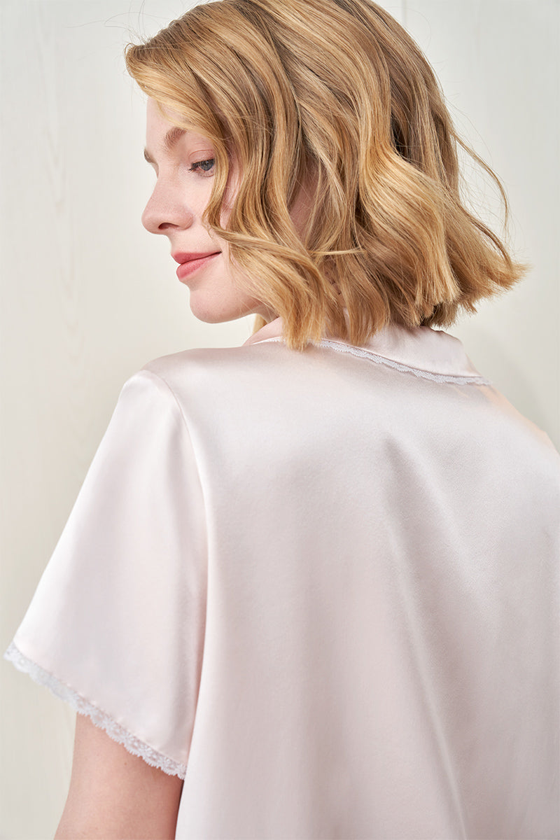 Pink Lunavie silk short sleeve pajama set for women, lightweight and comfortable, by MANITO, shown on a model.