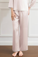 Manito Lunavie women's silk V-neck pajama set featuring smooth fabric and a relaxed fit, ideal for comfortable sleepwear.