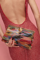 Multicolor clutch bag with intricate design from Sarah's Bag, featuring a vibrant, textured surface perfect for stylish accessories.