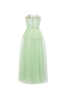 Mint tulle flower gown by 21Six, featuring layered tulle fabric and floral embellishments, perfect for special occasions.