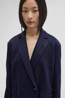 Navy TATS blazer by Maccapani, tailored fit blazer with classic lapel and sleek design, shown on a hanger.