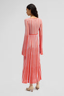 Maccapani orange maxi dress with flowing fabric and sleeveless design, perfect for summer or casual occasions.