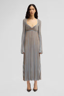 Maccapani Terry dress in Sand Sky, a flowy maxi dress with a relaxed fit and soft fabric, displayed on a hanger.