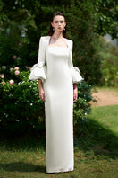 I.H.F column gown with trapeze neckline and rose draped three-quarter sleeves, elegant evening dress with flowing silhouette.