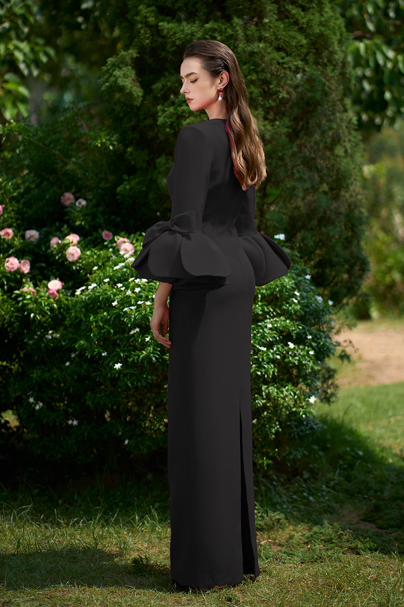BLACK COLUMN GOWN WITH TRAPEZE NECKLINE AND ROSE DRAPED THREE-QUARTER SLEEVES - CULT MIA