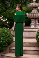 Green column gown with color patches and off-shoulder pads by I.H.F, featuring a sleek, fitted silhouette and unique patchwork design.