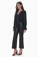Rebecca Taylor Madison crop kick flare pants in black, featuring a fitted waist and flared leg design.