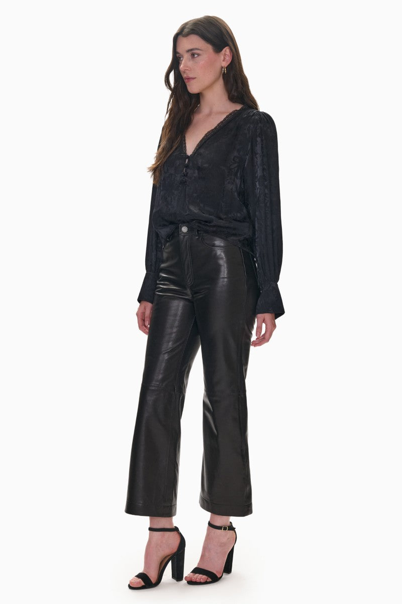 Rebecca Taylor Madison crop kick flare pants in black, featuring a fitted waist and flared leg design.