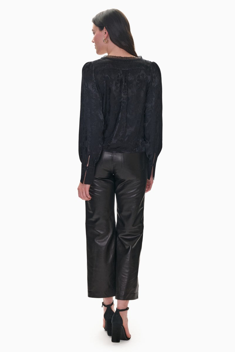 Rebecca Taylor Madison Crop Kick Flare Pants in black, showing fitted waist and flared leg design on a clean background.