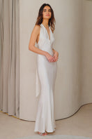 Sisters Maja maxi dress in white, flowing sleeveless design with a V-neck and ankle-length hem, perfect for summer occasions.
