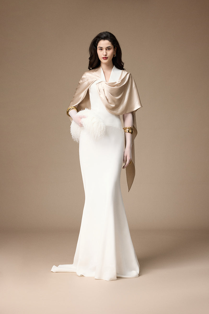 Jenny K Tran MARAI gown in off-white and beige, elegant long dress with flowing fabric, perfect for formal occasions.