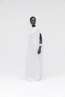 Studio NK ivory marble cape top, featuring a stylish and elegant design, showcased on a model.