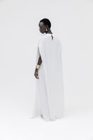 Ivory marble cape top by Studio NK featuring a flowing, elegant design with marble-inspired pattern and soft fabric.