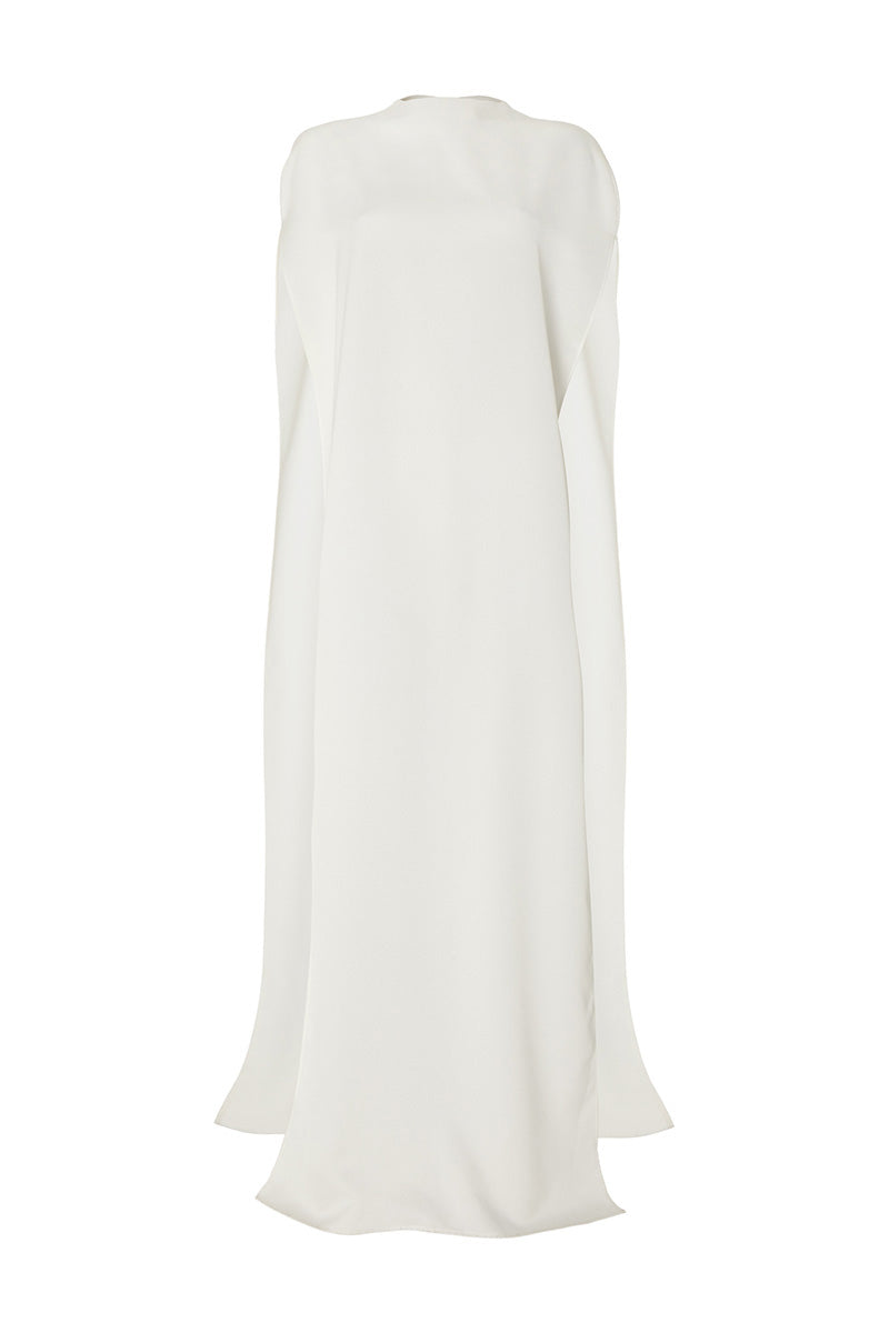 Ivory marble cape top by Studio NK, stylish sleeveless garment with a marble pattern, perfect for elegant casual wear.