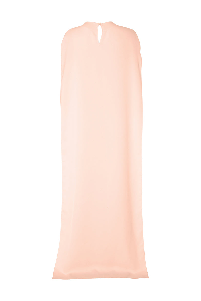 Studio NK marble cape in peach, stylish top with a flowing, marble-patterned fabric, perfect for a chic, modern look.