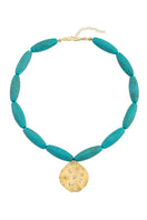Peracas MARE turquoise necklace featuring a vibrant turquoise pendant on a delicate chain.