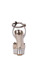Golden Terry de Havilland MARGAUX heels with pointed toes and elegant design, displayed on a neutral background.