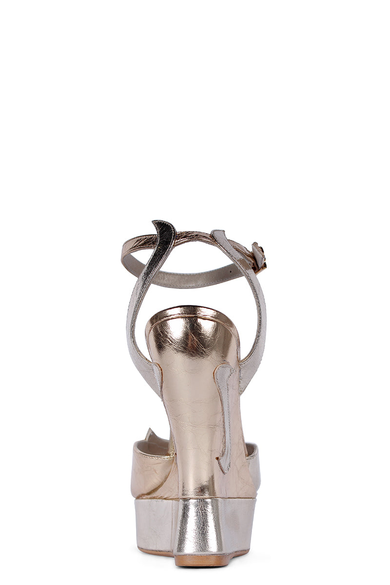 Golden Terry de Havilland MARGAUX heels with pointed toes and elegant design, displayed on a neutral background.