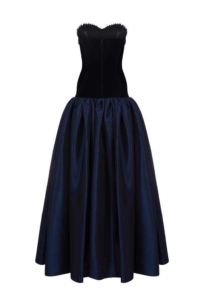 Black and navy Marina dress by MOON / HAKAN YILDIRIM, featuring a flowing maxi dress design with a back view.