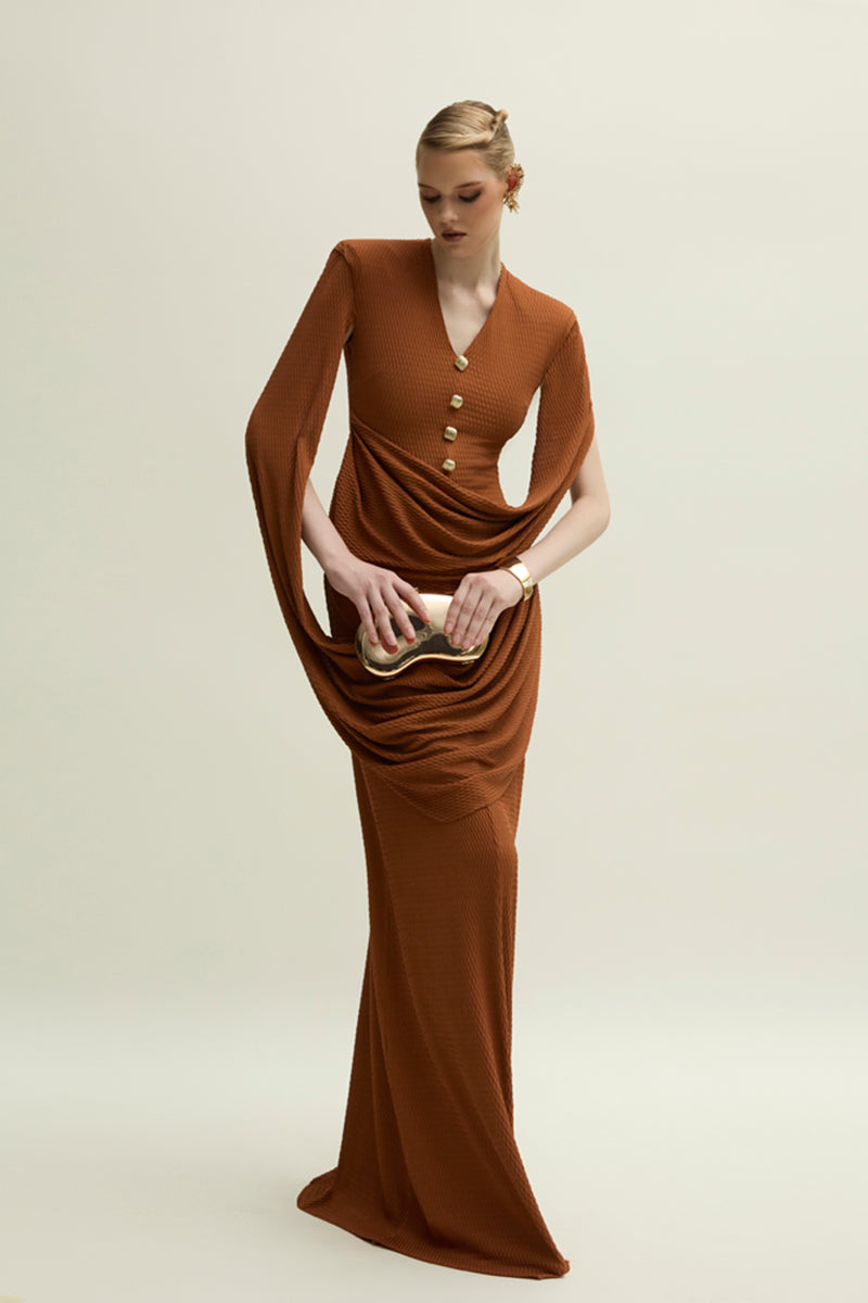 Jenny K Tran Marly gown in burnt orange, elegant evening dress with flowing fabric and stylish design.