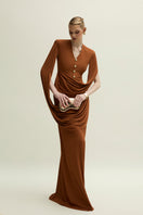 Jenny K Tran Marly gown in burnt orange, elegant evening dress with flowing fabric and stylish design.