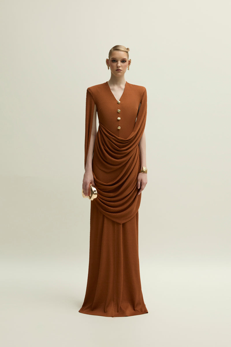 Jenny K Tran Marley dress in burnt orange, elegant gown with flowing fabric and stylish design, perfect for formal occasions.