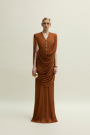 Jenny K Tran Marley dress in burnt orange, elegant gown with flowing fabric and stylish design, perfect for formal occasions.