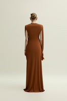 Jenny K Tran Burnt Orange Marley gown featuring flowing fabric and elegant design, perfect for formal occasions.
