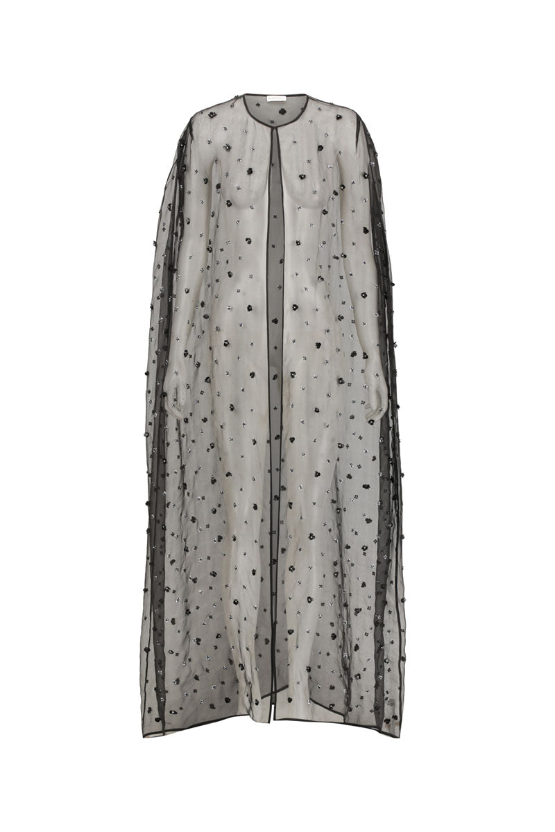 Black maxi floral beaded cape by Mastani, showcasing intricate floral beadwork and flowing fabric design.