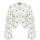 White Jessica K Mayra cardigan with crystal embellishments, featuring a soft knit fabric and stylish design.