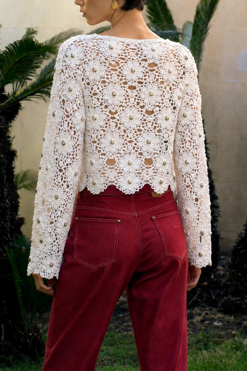 Jessica K Mayra white cardigan with crystal embellishments, showcasing a stylish knit design and elegant details.