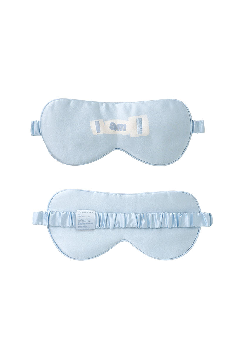 Blue silk eye mask from MANITO featuring MBTI personality design for comfortable sleep and relaxation.